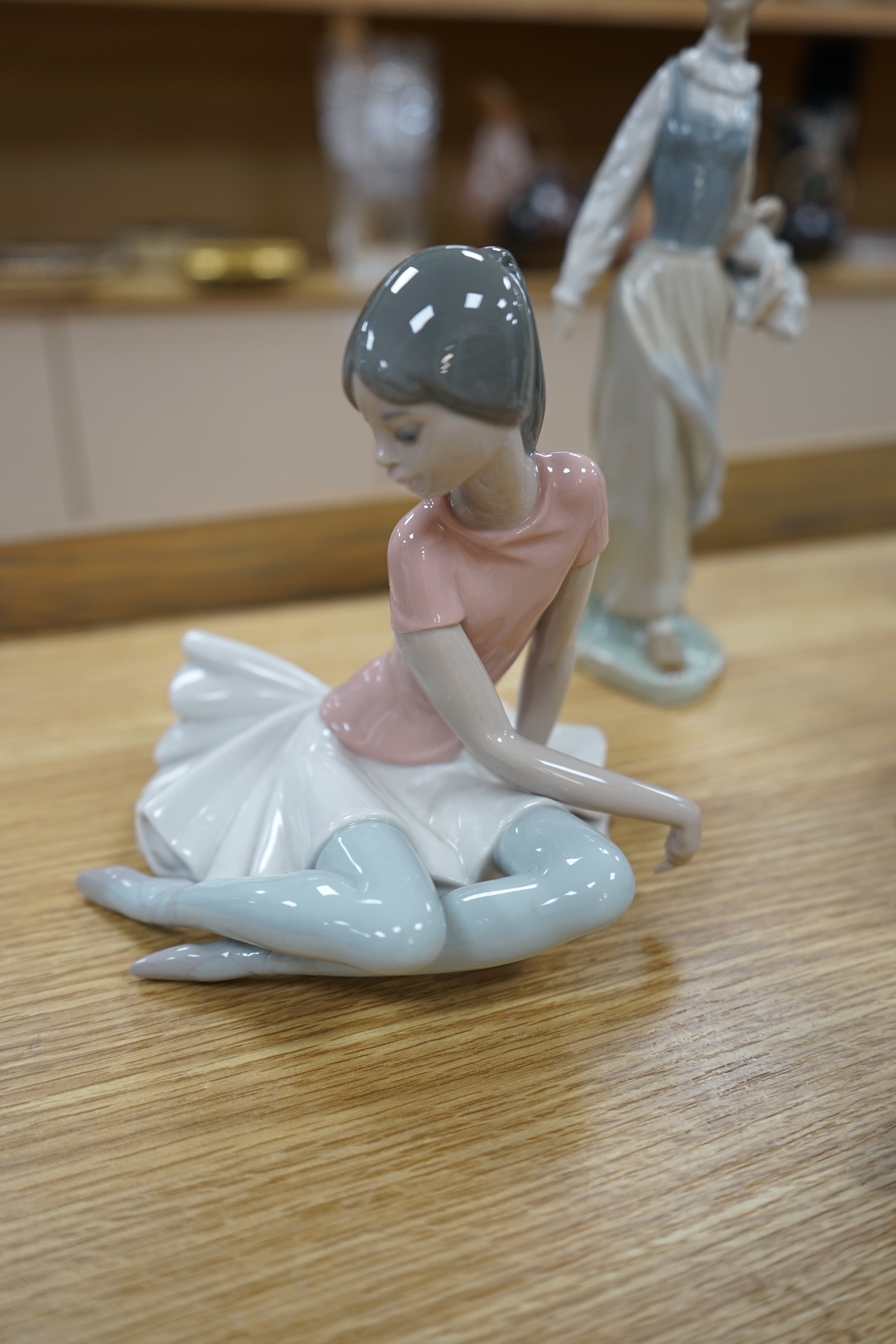 Five Lladro figurines and birds together with a Royal Doulton figure ‘Elegance’, HN2264, largest 36cm high. Condition - good